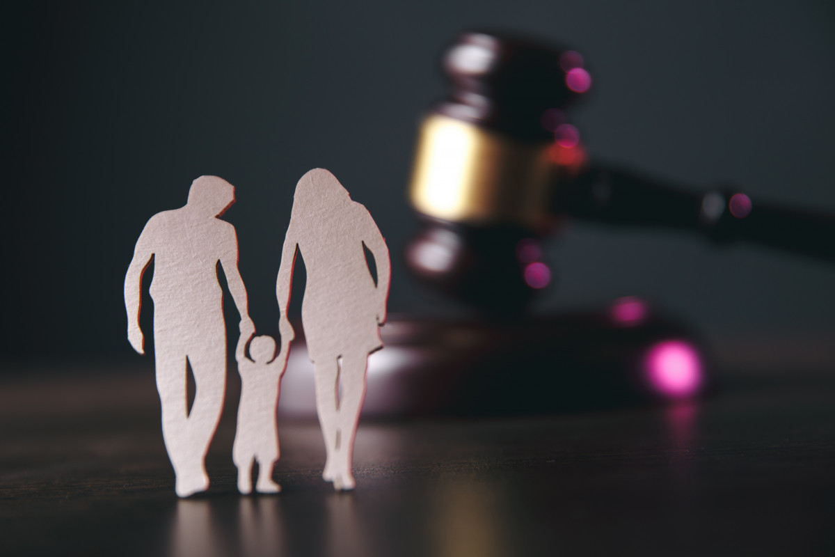 Cardboard Family Walking to Judgement for a Custody Ruling